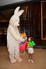 Easter Bunny with kids at Phoenix Market City easter party in Mumbai on 14th April 2014